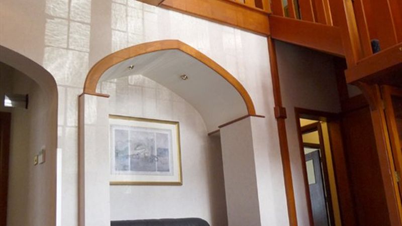 The main atrium, seen on entry, is an impressive and  beautifully panelled yellow pine hall complete